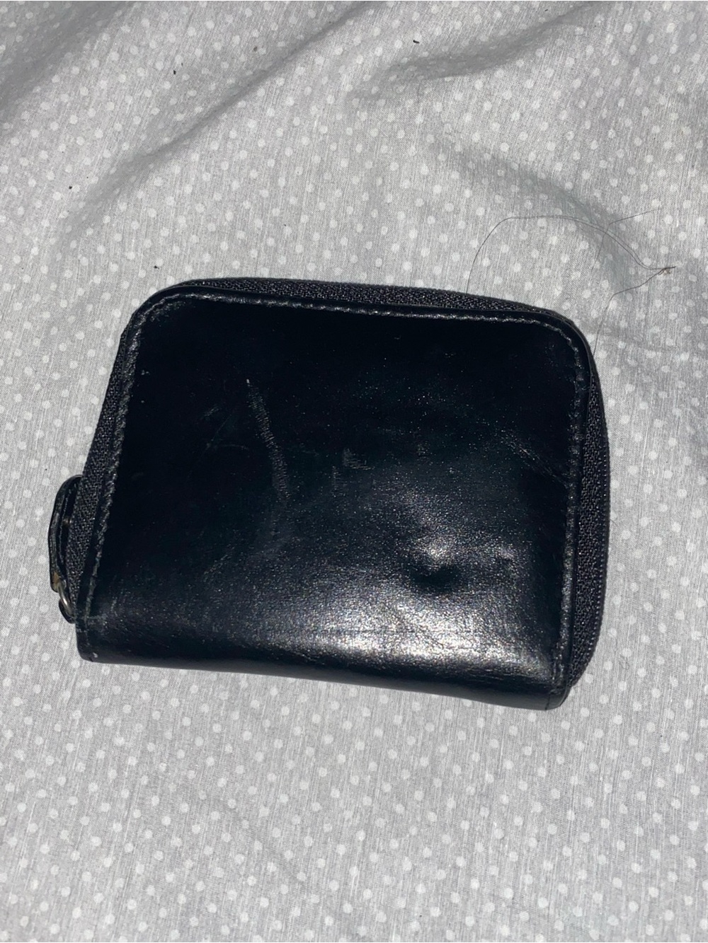 Isaac mizrahi black wallet featuring distinctive kiss lock metal clasp closure